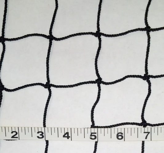 A close up of a net with a ruler