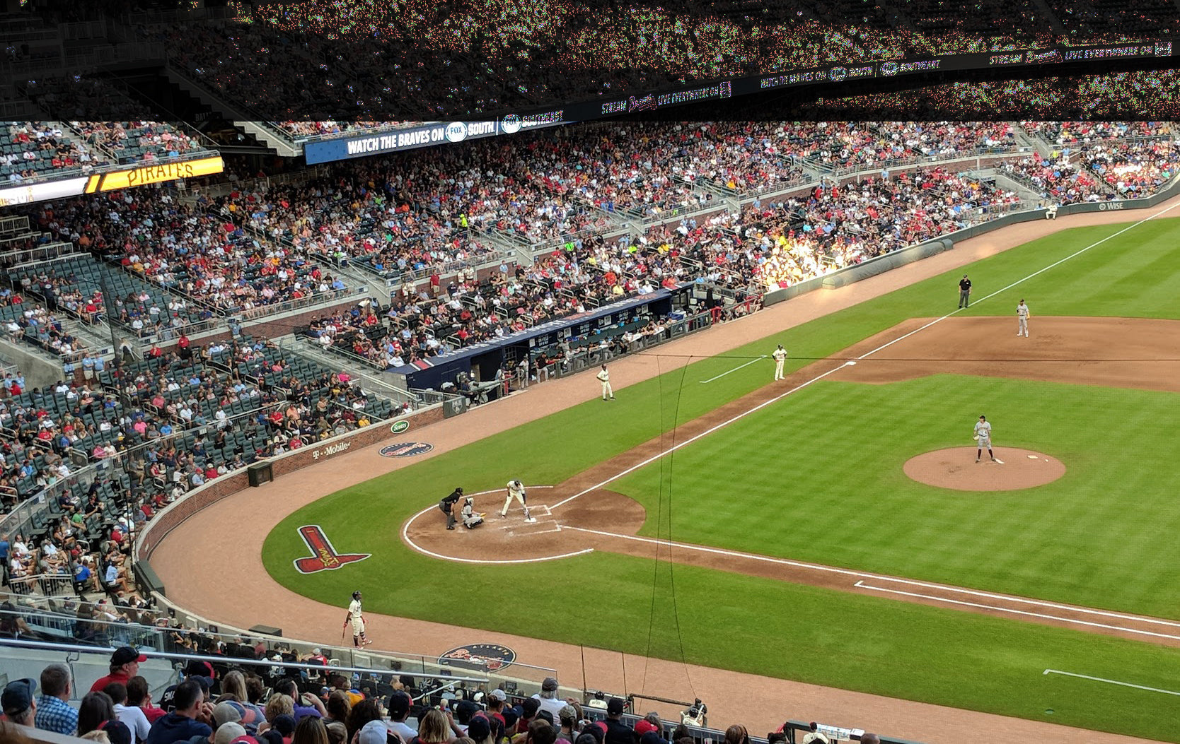 A baseball game in progress with the batter up.