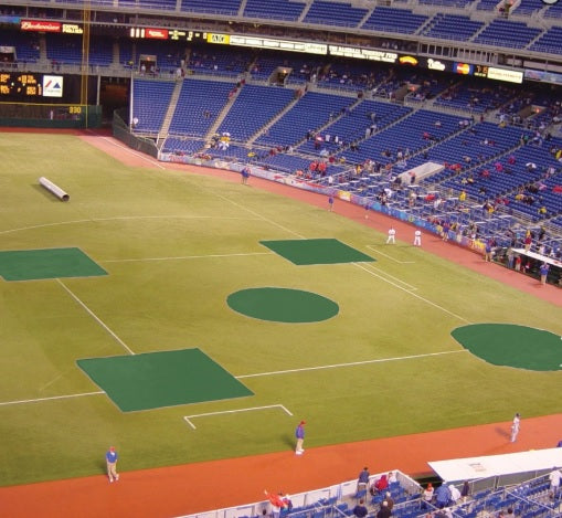 A baseball field with many players in it